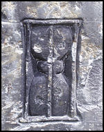 Hourglass on headstone of Rebekah Bonfild