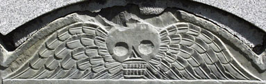 Winged Death's Head on Headstone of Christopher Lattimore.